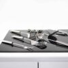 Juego utensilios de cocina de acero inoxidable (7 piezas) Kaiser, 1 colgador, 1 cucharón, 1 tenedor de trinchar, 1 espumadera, 1 prensa patatas, 1 batidor de varillas, 1 espátula 5 herramientas graf 1 scaled