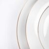 Detalle del filo de oro de los platos blancos Bremen