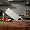 Cuchillo de cocina ancho sobre una tabla